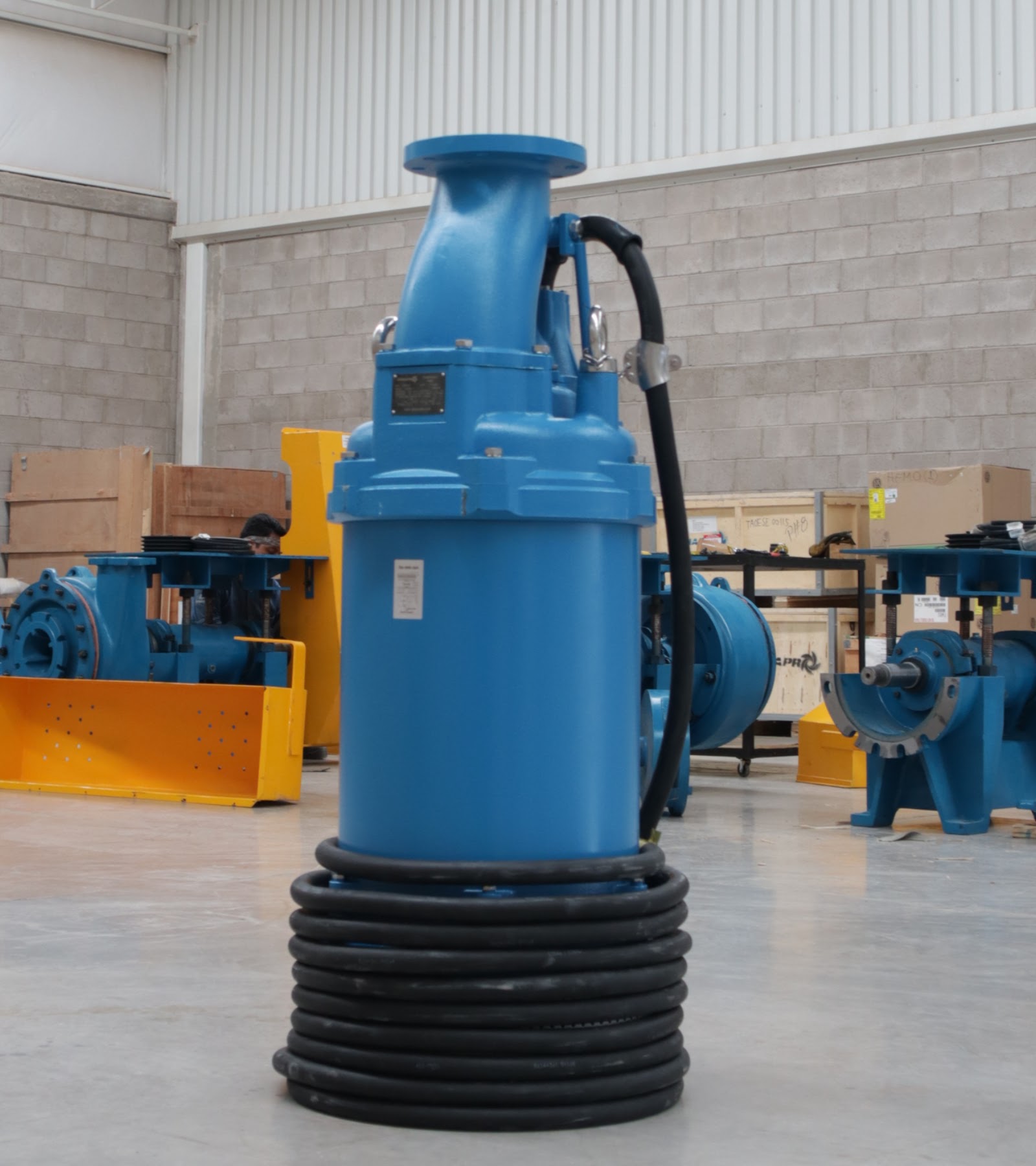 Large Dynapro industrial submersible pump in a pump workshop.